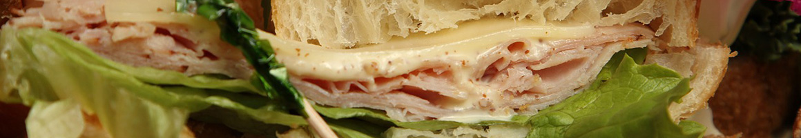 Eating Sandwich Bagels at HG Bucks Bagels restaurant in Warminster, PA.